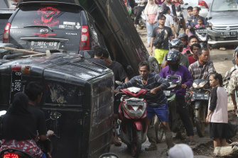 Cars were swept away by the flood in Bekasi, West Java.