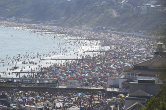People on the beach at Bournemouth. Temperatures reached 32.6C at London's Heathrow Airport on Wednesday.