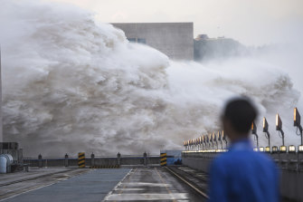 Floodwaters are discharged at the Three Gorges Dam in central China’s Hubei province on Sunday.