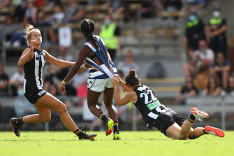 Collingwood’s Sophie Casey, right, tackles Geelong’s Stephanie Williams . 
