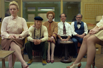 From left, Elisabeth Moss, Owen Wilson, Tilda Swinton, Fisher Stevens and Griffin Dunne in a scene from The French Dispatch. 