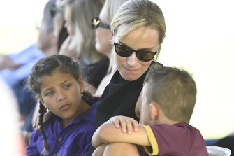 Andrew Symonds’ wife Laura with their daughter Chloe and son Will at the public memorial service at Riverway Stadium. 