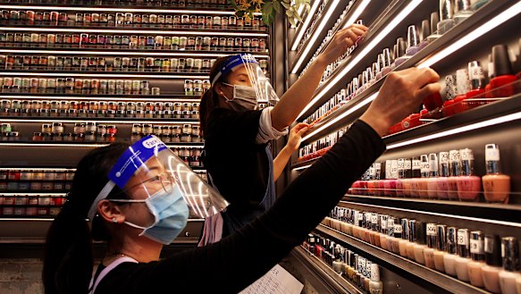 Nail technicians at Broadway Shopping Centre. Mirvac Retail has mandated masks be worn by all their staff in shopping centres as part of their health and safety precautions in response to the ongoing COVID-19 pandemic. 
