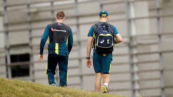 Walk on: Steve Smith, left, and Cameron Bancroft talk at a training in Southampton on Monday.