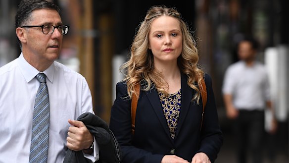 Eryn Jean Norvill and lawyer Leon Zwier arrive at the Federal Court on Friday. 
