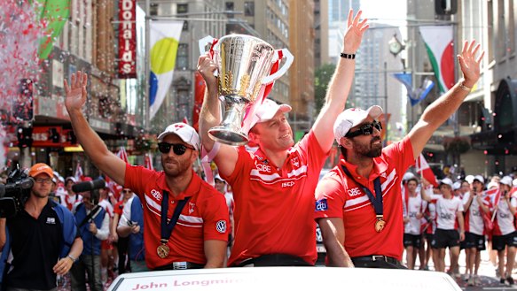 Spoils of victory: Longmire led Sydney to the ultimate prize in 2012.