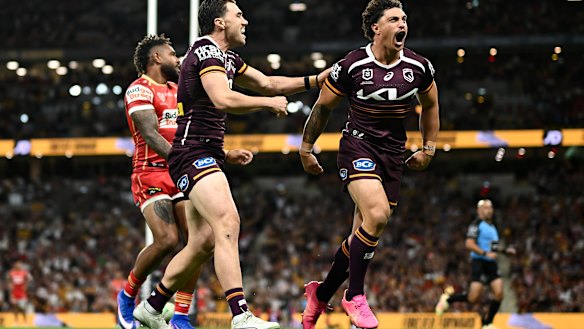 Kotoni Staggs celebrates a try against the Dolphins.