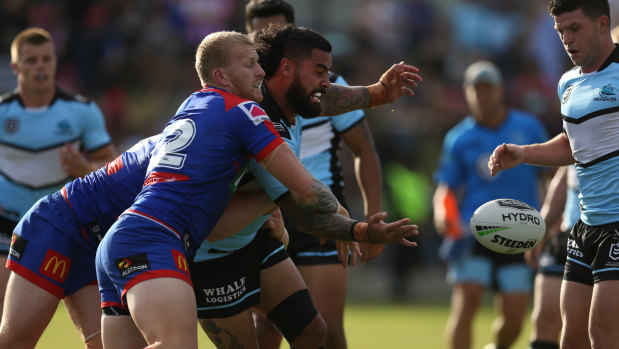 Out the back: Andrew Fifita manages an offload against the Knights at Maitland Sportsground.