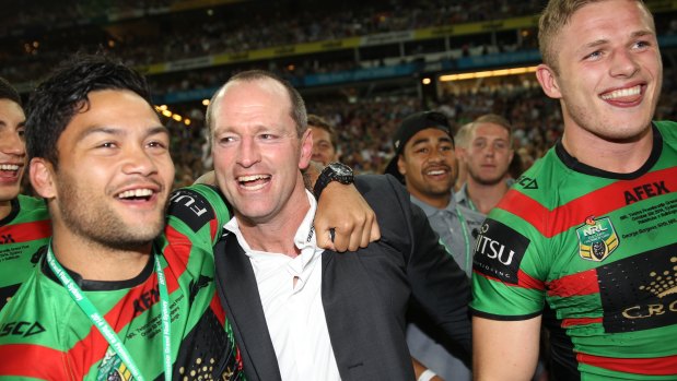 Fresh outlook: Michael Maguire (centre), Souths' premiership-winning coach in 2014.