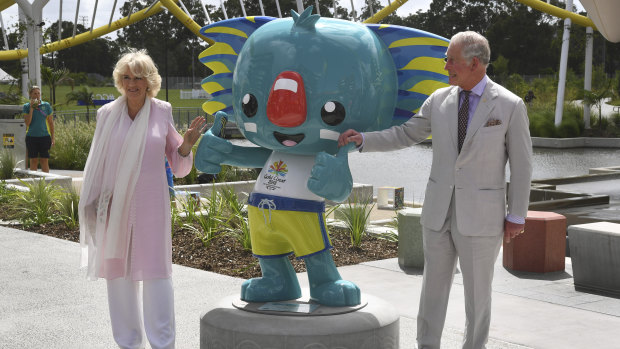 Camilla and Prince Charles pose with the Commonwealth Games mascot, Borobi. 