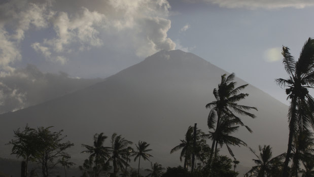 Mount Agung spewing ash and smoke in an during an eruption on July 5, 2018.  The Easter Sunday 2019 eruption has not impacted flights.