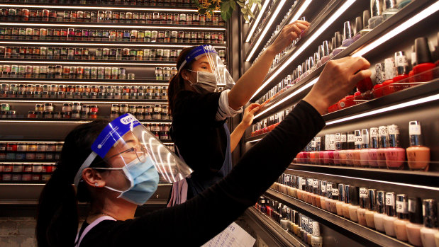 Nail technicians at Broadway Shopping Centre. Mirvac Retail has mandated masks be worn by all their staff in shopping centres as part of their health and safety precautions in response to the ongoing COVID-19 pandemic. 