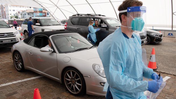 A new drive-through clinic at Bondi Beach can test 16 motorists at once.