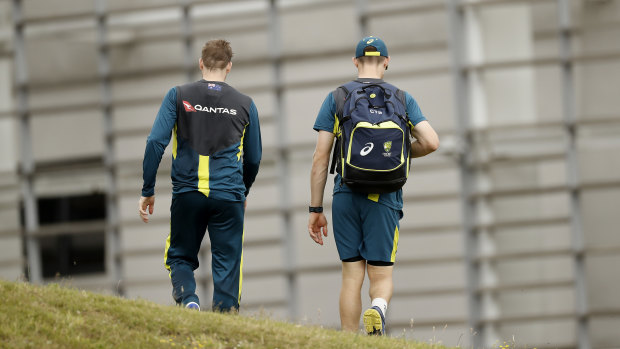 Walk on: Steve Smith, left, and Cameron Bancroft talk at a training in Southampton on Monday.