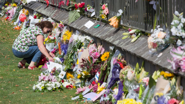 A floral tribute on the fence of the Christchurch Botanic Gardens