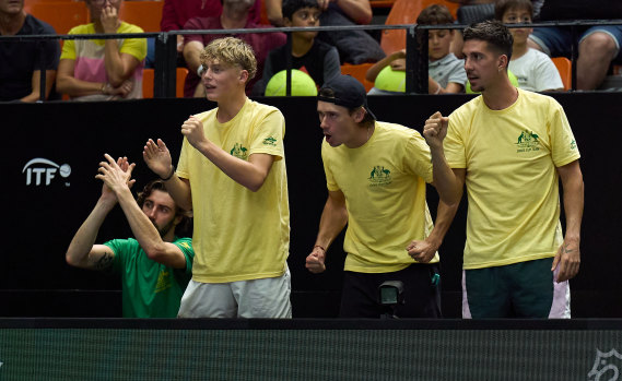 Jordan Thompson, Cruz Hewitt, Alex de Minaur and Thanasi Kokkinakis cheer on Matt Ebden and Max Purcell.