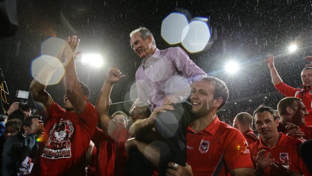 Hero to villain: Wayne Bennett and the Dragons celebrate a premiership in 2010. But things have soured between the super coach and Dragons since.