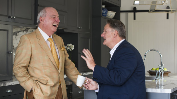 Alan Jones and Mark Latham enjoy a chat in the kitchen.