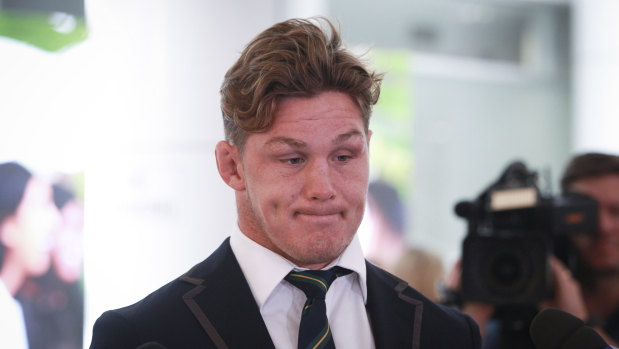 Michael Hooper cut a frustrated figure at Sydney Airport after Australia's World Cup exit. 