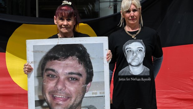 The family of Nathan Reynolds ... his grandmother Toni Reynolds (left) and Nathan’s mother Jodie Reynolds outside the Coroner’s Court at Lidcombe. 
