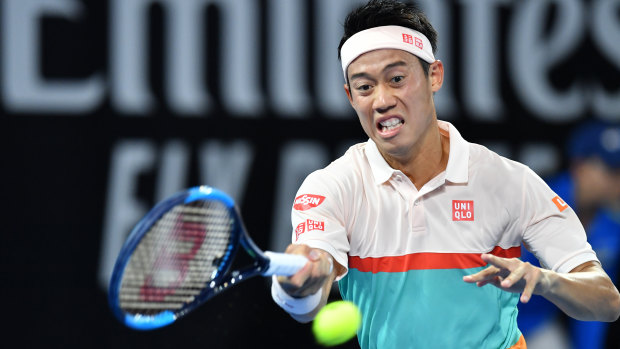 On a roll: Kei Nishikori blasts a forehand during his straight-sets win against Grigor Dimitrov on Thursday night.