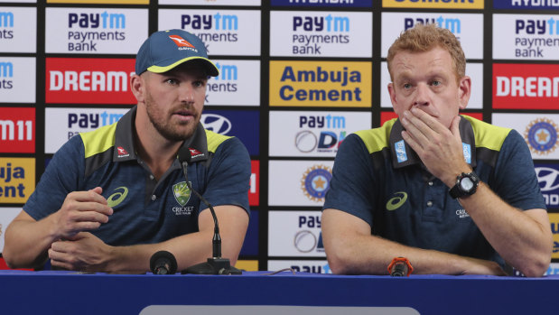 One-day captain Aaron Finch with Andrew McDonald at a press conference in Mumbai ahead of their three-match one-day international series against India.
