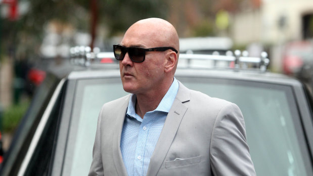 Respect: Paul McGregor arrives at the funeral of Lance Thompson on Friday.