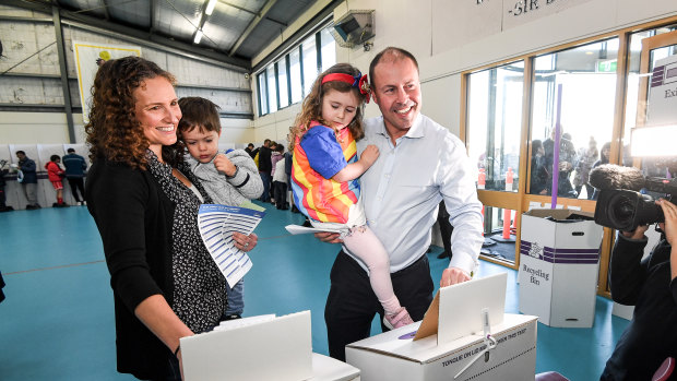 Josh Frydenberg voting in Kooyong with his family.