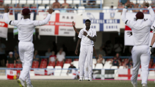 This one's for Mum: West Indian paceman Alzarri Joseph celebrates one of his two wickets after learning of the death of his mother.