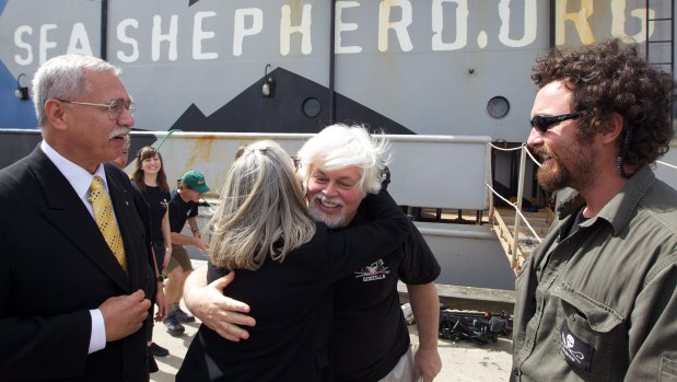 Watson receives a hug after docking in Melbourne's Williamstown following a campaign to stop Japanese whaling.