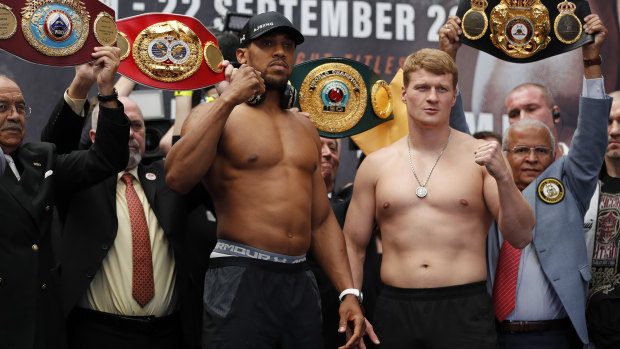 Size difference: Britain's Anthony Joshua and Russia's Alexander Povetkin.