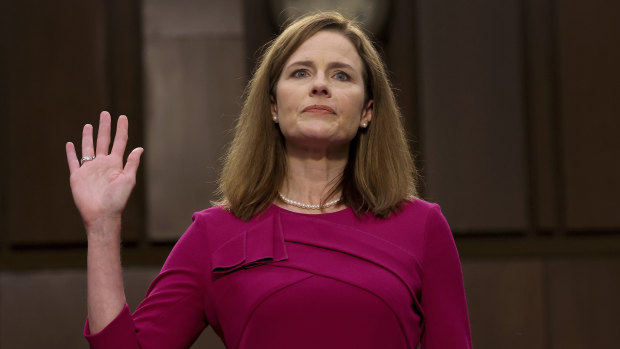 Supreme Court nominee Amy Coney Barrett is sworn in during a confirmation hearing before the Senate Judiciary Committee.