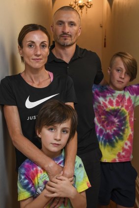 Marathon runner Sinead Diver at her Melbourne home with husband Colin, and sons Eddie, 11, and Dara, 7.