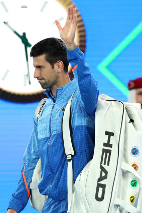 Novak Djokovic returns to Rod Laver Arena.