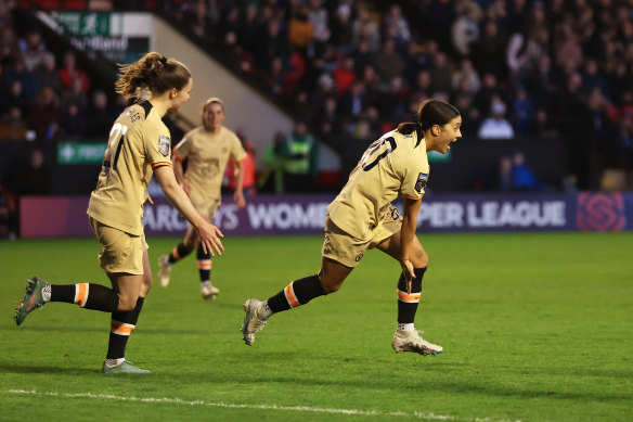 Sam Kerr celebrates after scoring Chelsea’s third against Aston Villa.