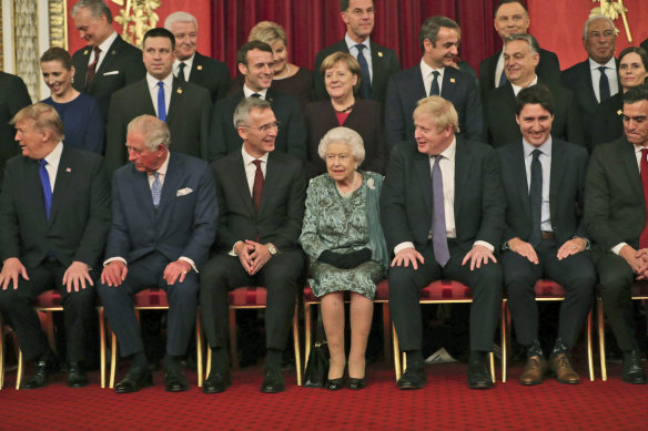 Queen Elizabeth II hosts NATO leaders on the 70th anniversary of the alliance during a reception at Buckingham Palace.