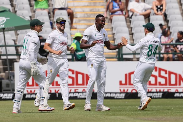 Kagiso Rabada celebrates taking the wicket of Travis Head.