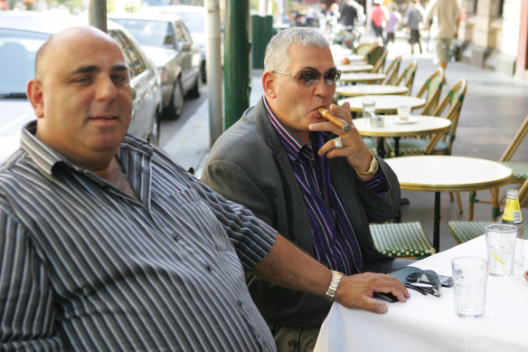 John Khoury and Mick Gatto, seen here in 2009 at a cafe in the Melbourne CBD, are long-time friends and business associates. 
