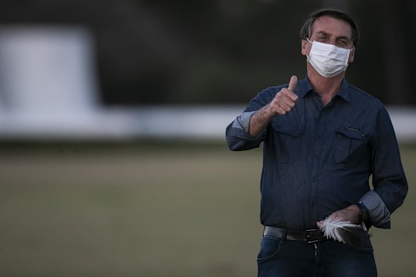 Brazilian President Jair Bolsonaro outside his official residence after testing positive for coronavirus for the second time.