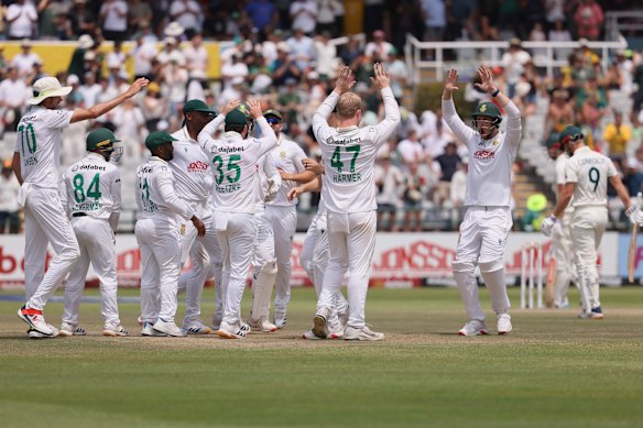 Simon Harmer celebrates during a wild first session in the fifth day.