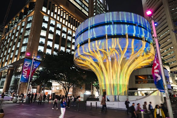 The CTA building in Martin Place, lit up for Vivid. 