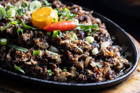 Pampanga-style sisig, a sizzling platter of pork and chicken liver.