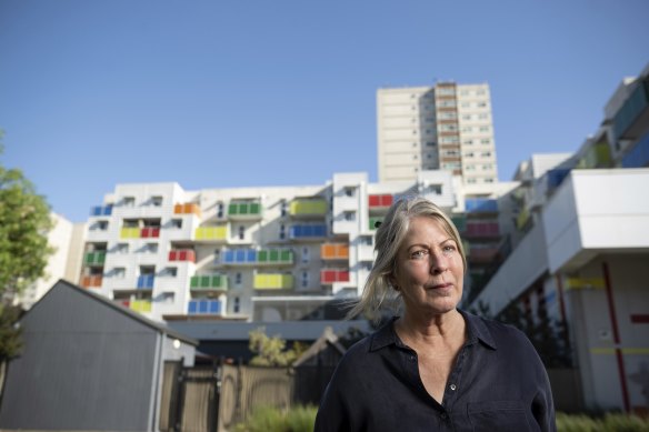 Urban geographer at Melbourne University Dr Kate Shaw in front of a social housing block constructed on the Atherton Gardens public housing estate in Fitzroy. 