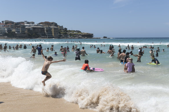 Sydneysiders cool off at Bondi Beach during a heatwave in 2021.