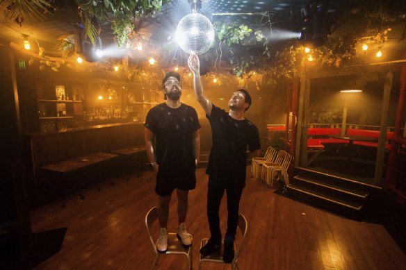 Kyle Bush (L) and Jaff Tzaferis, co-owners of New Guernica nightclub in the city are set for dancers to return to the floor.