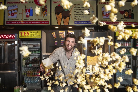 Manager Adam Meyers working at Cinema Nova.