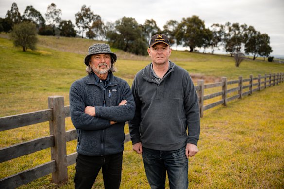 Mark Trengove and Michael Dragt on Staughton Vale Road with the site of Bacchus Marsh Grammar School’s Staughton Vale farm campus driveway behind them.