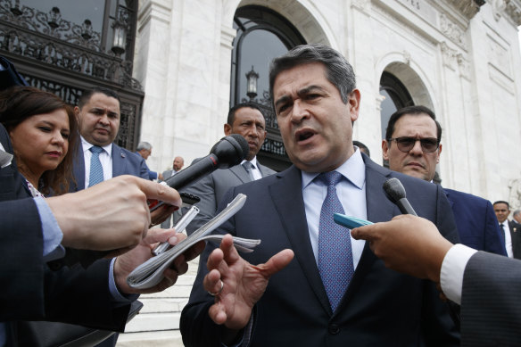 Honduran President Juan Orlando Hernandez speaks to reporters in Washington in 2019.