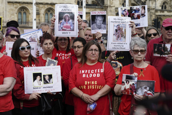 Infected blood campaigners gather in Parliament Square, London, ahead of the publication of the final report into the scandal.