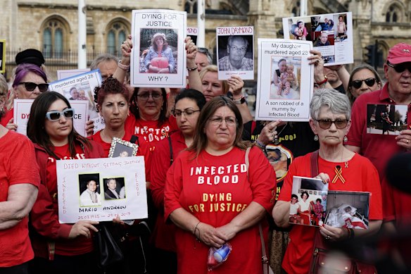 Infected blood campaigners gather in Parliament Square, London, ahead of the publication of the final report into the scandal.